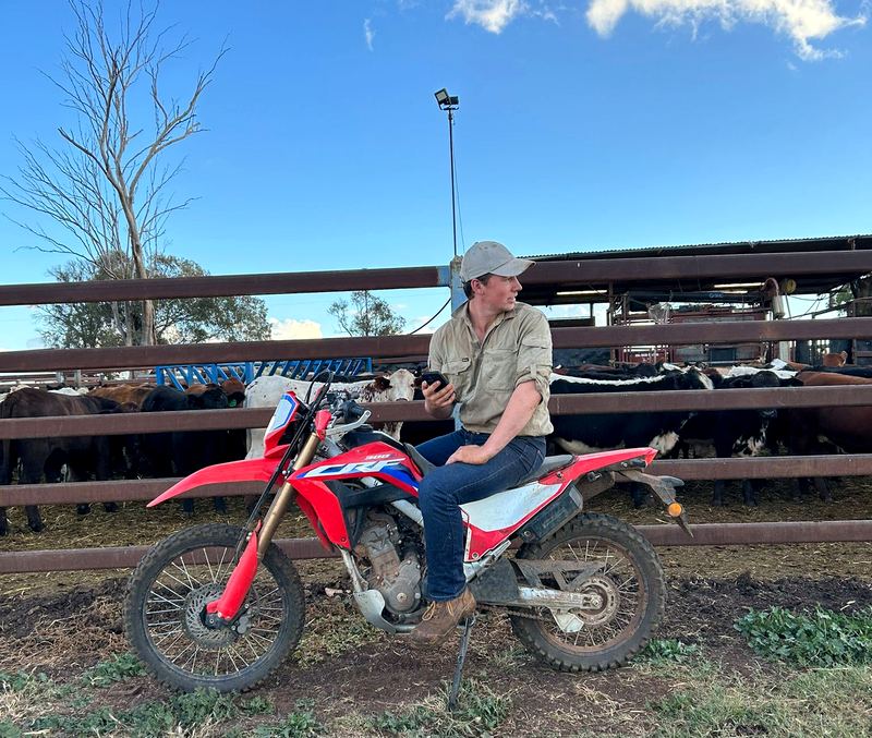 Yannik Schröder on a dirt bike at a feedlot in Queensland